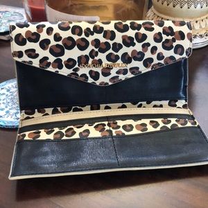 Cynthia Ridley wallet - holds 10 credit cards